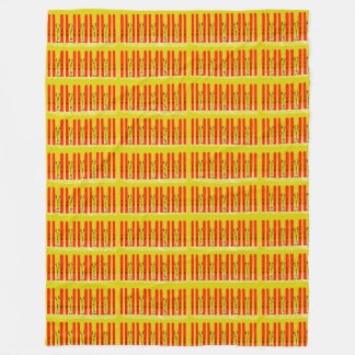 Red skis on yellow fleece blanket