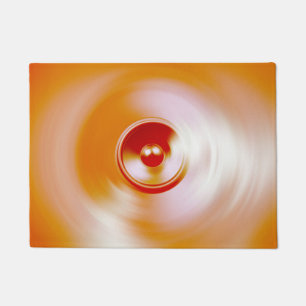 Red spinning music speaker doormat
