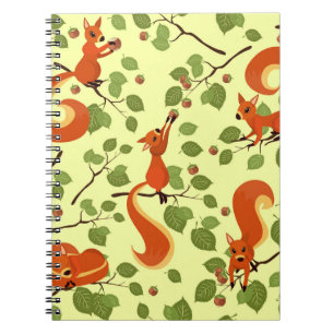 Red squirrel in hazel branches. notebook