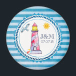 Red Striped Watercolor Lighthouse Wedding Magnet<br><div class="desc">A wedding magnet with a nautical theme. Designed on a blue striped pattern and a circular nautical frame layered over top. A red striped lighthouse and a beach ball, with a smiling sun and seagull flying off in the distance positioned inside the frame. Personalise with your initials and wedding date....</div>