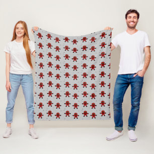 Red suit astronauts on grey fleece blanket