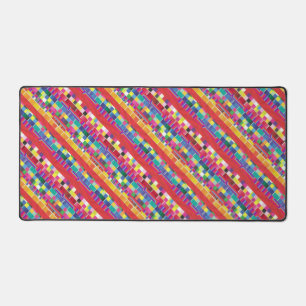 red swatches, stripes, and colourful pixels desk mat