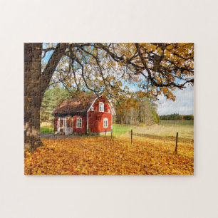 Red Swedish House Amongst Autumn Leaves Jigsaw Puzzle