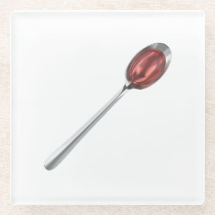 Red syrup in silver spoon glass coaster