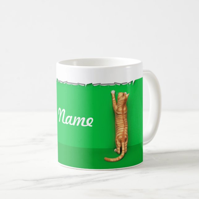 Red tabby cat rips paper coffee mug (Front Right)