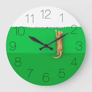 Red tabby cat rips paper round clock