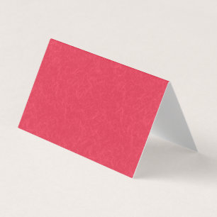 Red textured background with swirling pattern business card