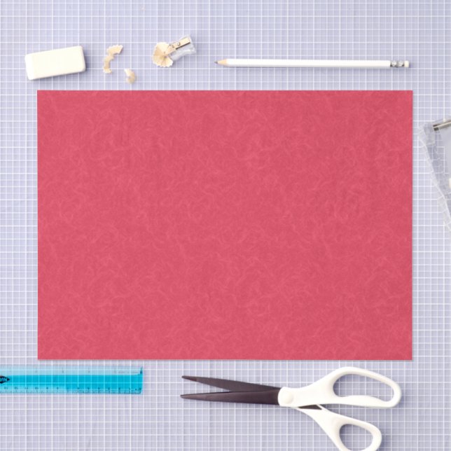 Red textured background with  swirling pattern tissue paper (Craft)