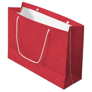 Red textured surface with subtle swirling pattern large gift bag