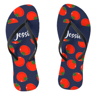 Red tomatoes on blue flip flops