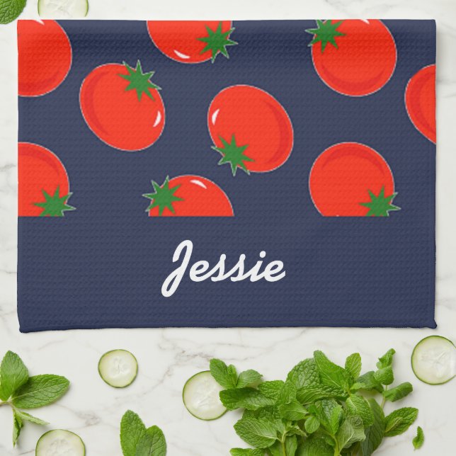 Red tomatoes on blue tea towel (Folded)