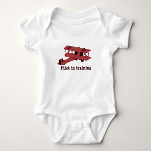red toy biplane baby shirt