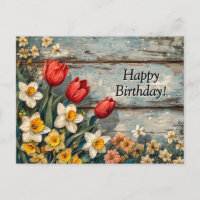 Red Tulips and Daffofils on Blue Wood