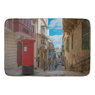 Red vintage mail box in Malta Bath Mat