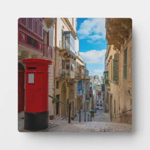 Red vintage mail box in Malta Plaque