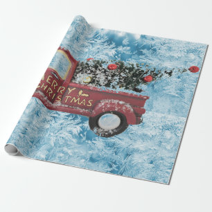 red vintage truck on a blue snowflake background   wrapping paper