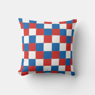 Red white and blue chequered pattern cushion