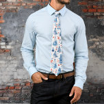 Red, White, and Blue Winter Wonderland Tie<br><div class="desc">This men's necktie features a whimsical winter wonderland design, showcasing a playful pattern of watercolor-style elements in frosty blues and vibrant reds. The tie is adorned with charming snowmen in bright red hats, festive fir trees decorated with ornaments, delicate snowflakes, and cheerful red berries. The subtle watercolor effect lends an...</div>