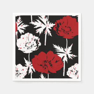 Red, white flowers on black napkin