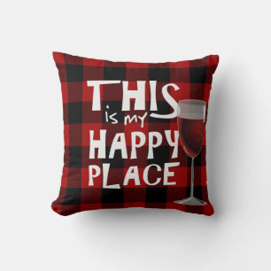 red wine and quote on buffalo plaid cushion