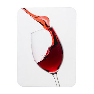 red wine flows into the wine glass magnet