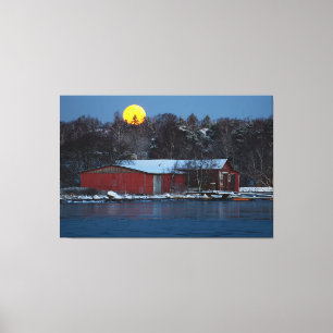 Red wooden boathouse in Helsinki, Finland Canvas Print