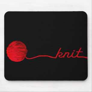 red yarn on black with knit text mouse mat