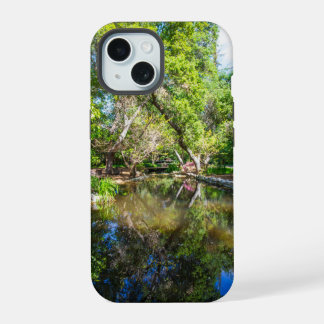 reflections on the pond in the garden iPhone 15 case