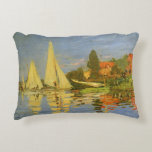 Regatta at Argenteuil by Claude Monet Decorative Cushion<br><div class="desc">Regatta at Argenteuil (1872) by Claude Monet is a vintage impressionism fine art nautical painting. You can see the reflection of the sailboats in the lake water. A maritime seascape with a yacht or boat race on a sunny summer season day. About the artist: Claude Monet (1840-1926) was a founder...</div>