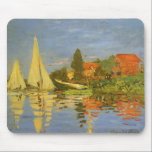 Regatta at Argenteuil by Claude Monet Mouse Mat<br><div class="desc">Regatta at Argenteuil (1872) by Claude Monet is a vintage impressionism fine art nautical painting. You can see the reflection of the sailboats in the lake water. A maritime seascape with a yacht or boat race on a sunny summer season day. About the artist: Claude Monet (1840-1926) was a founder...</div>