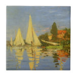 Regatta at Argenteuil by Claude Monet Tile<br><div class="desc">Regatta at Argenteuil (1872) by Claude Monet is a vintage impressionism fine art nautical painting. You can see the reflection of the sailboats in the lake water. A maritime seascape with a yacht or boat race on a sunny summer season day. About the artist: Claude Monet (1840-1926) was a founder...</div>