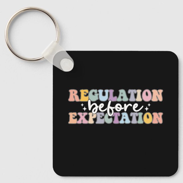 Regulation Before Expectation Groovy Key Ring (Front)