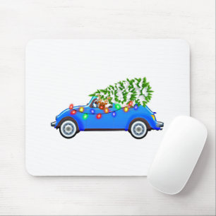 Reindeer driving a beetle with christmas treeb mouse mat