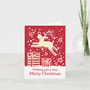 Reindeer prancing over gifts red Christmas card