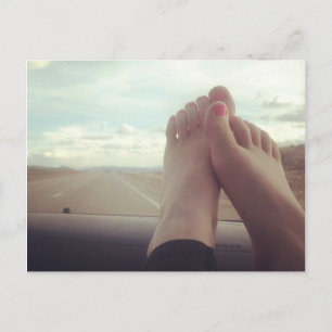 relax feet on the dashboard postcard