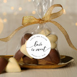 Relax Script Love is Sweet Wedding Favour Classic Round Sticker<br><div class="desc">Wedding favour sticker featuring the words "love is sweet" in a relax cursive script in black against a white background. Personalise it by replacing the placeholder text. For more options such as to change the font and it's size/colour, expand /contract curve or the spacing between letters click the "Customise" button....</div>