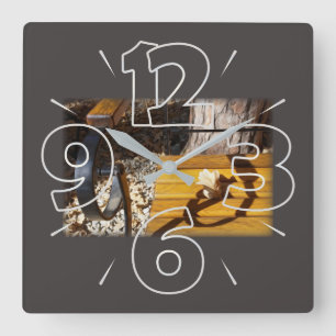 Relaxing in the autumn sun square wall clock