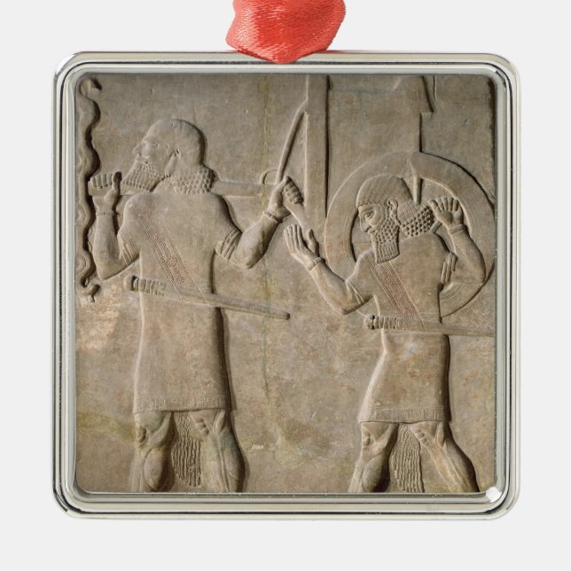 Relief depecting two soldiers metal tree decoration (Front)