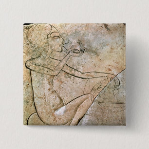 Relief depicing a princess eating a roasted 15 cm square badge