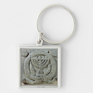 Relief depicting a menorah key ring