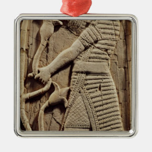 Relief depicting a warrior metal tree decoration