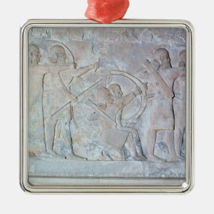 Relief depicting archers metal tree decoration