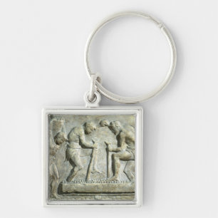 Relief depicting pavers key ring