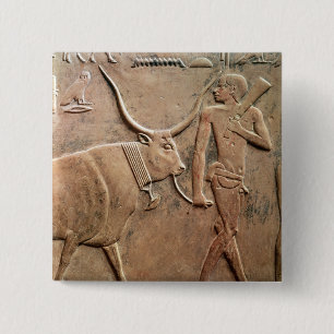 Relief depicting peasant leading cow to 15 cm square badge