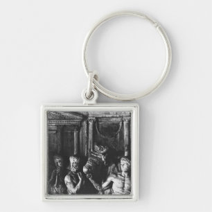 Relief depicting preparations for a sacrifice key ring
