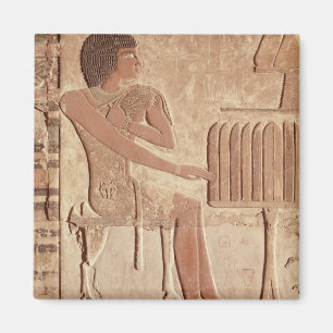 Relief depicting the deceased seated magnet