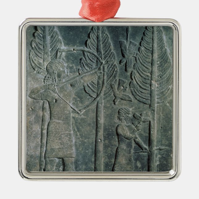 Relief depicting the hunting of birds in the metal tree decoration (Front)