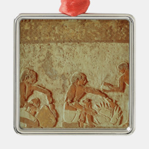 Relief depicting the making and baking of bread metal tree decoration