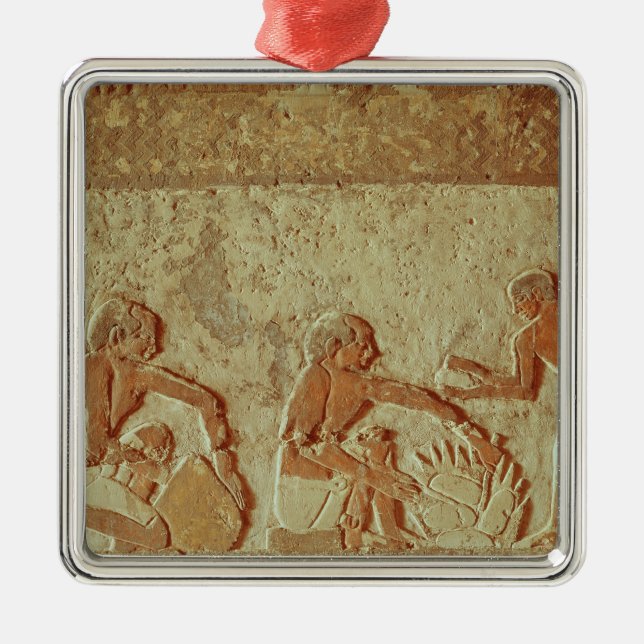 Relief depicting the making and baking of bread metal tree decoration (Front)