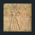 Relief depicting Tuthmosis III  making an Magnet<br><div class="desc">Egyptian 18th Dynasty's Relief depicting Tuthmosis III (c.1479-1425 BC) making an offering to a seated god,  New Kingdom (stone) located at the Karnak Temple,  Karnak,  Egypt. The Relief depicting Tuthmosis III (c.1479-1425 BC) making an offering to a seated god,  New Kingdom was created around the 15th century.</div>